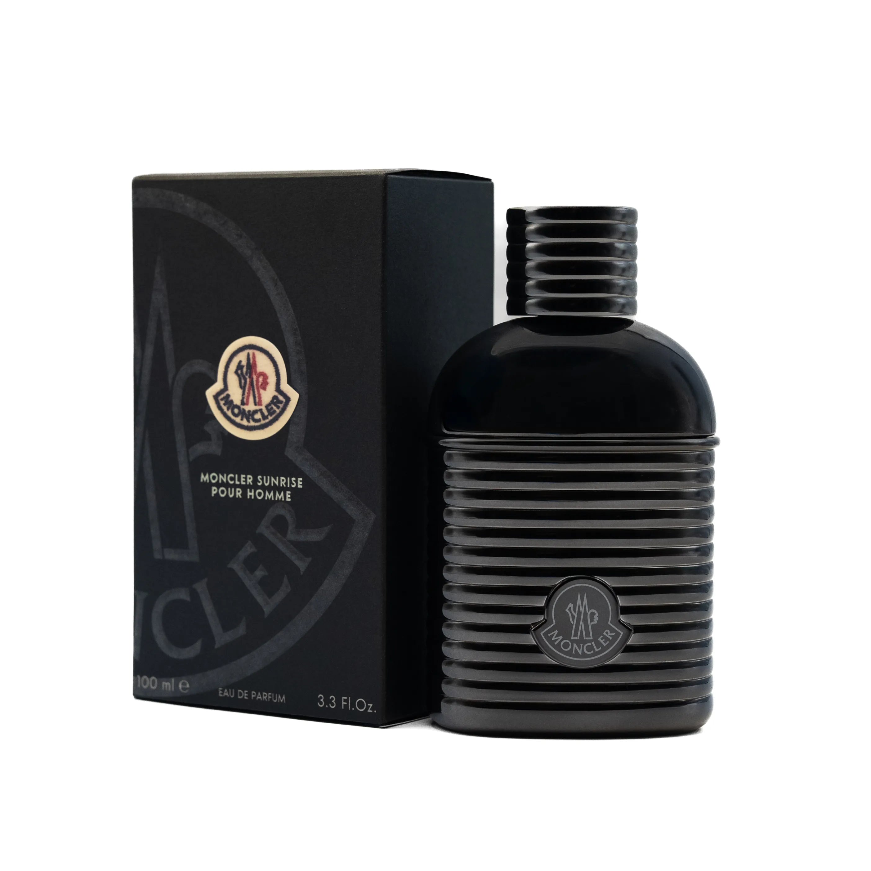 Black Moncler perfume bottle and packaging on a white background