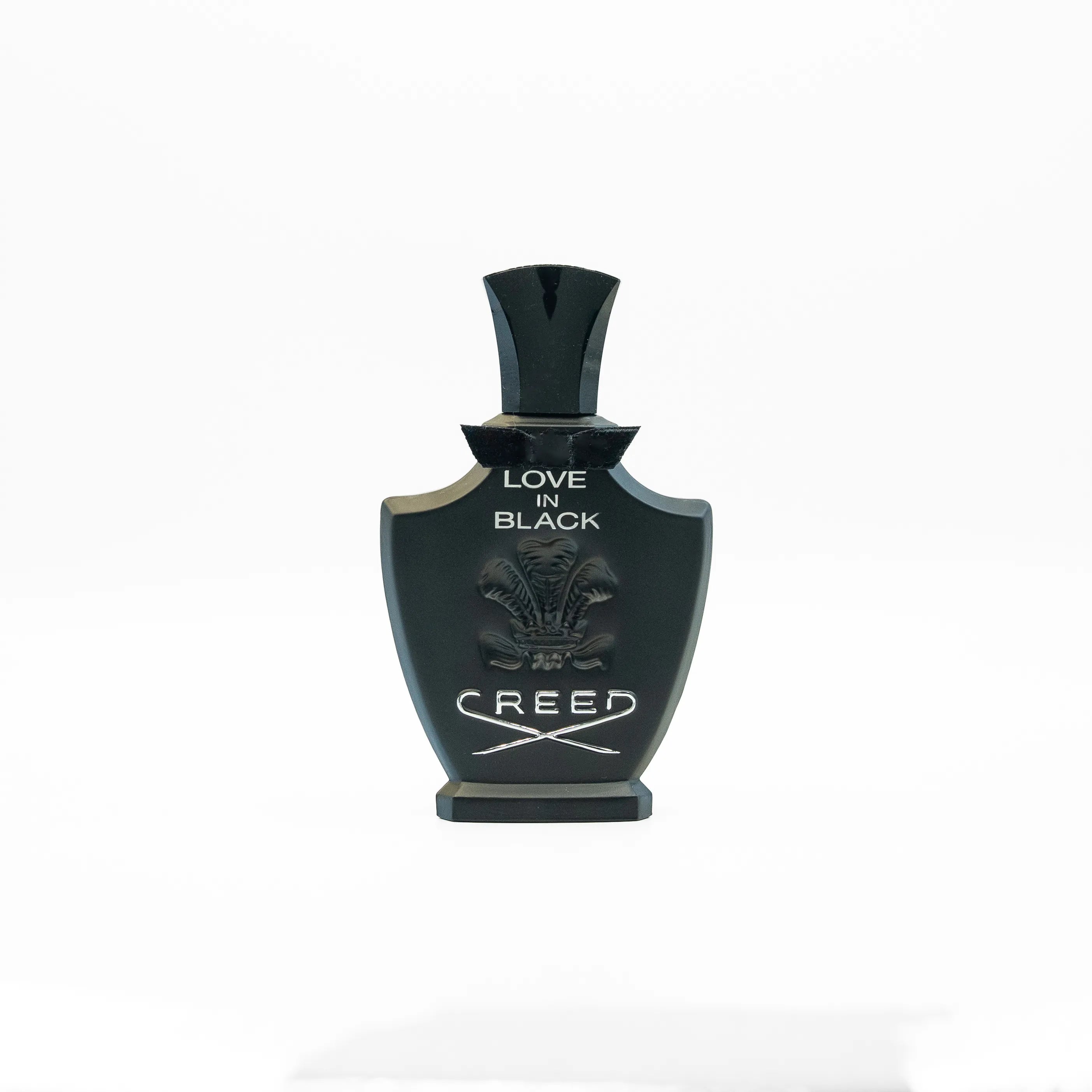 Creed 'Love in Black' perfume bottle on a white background