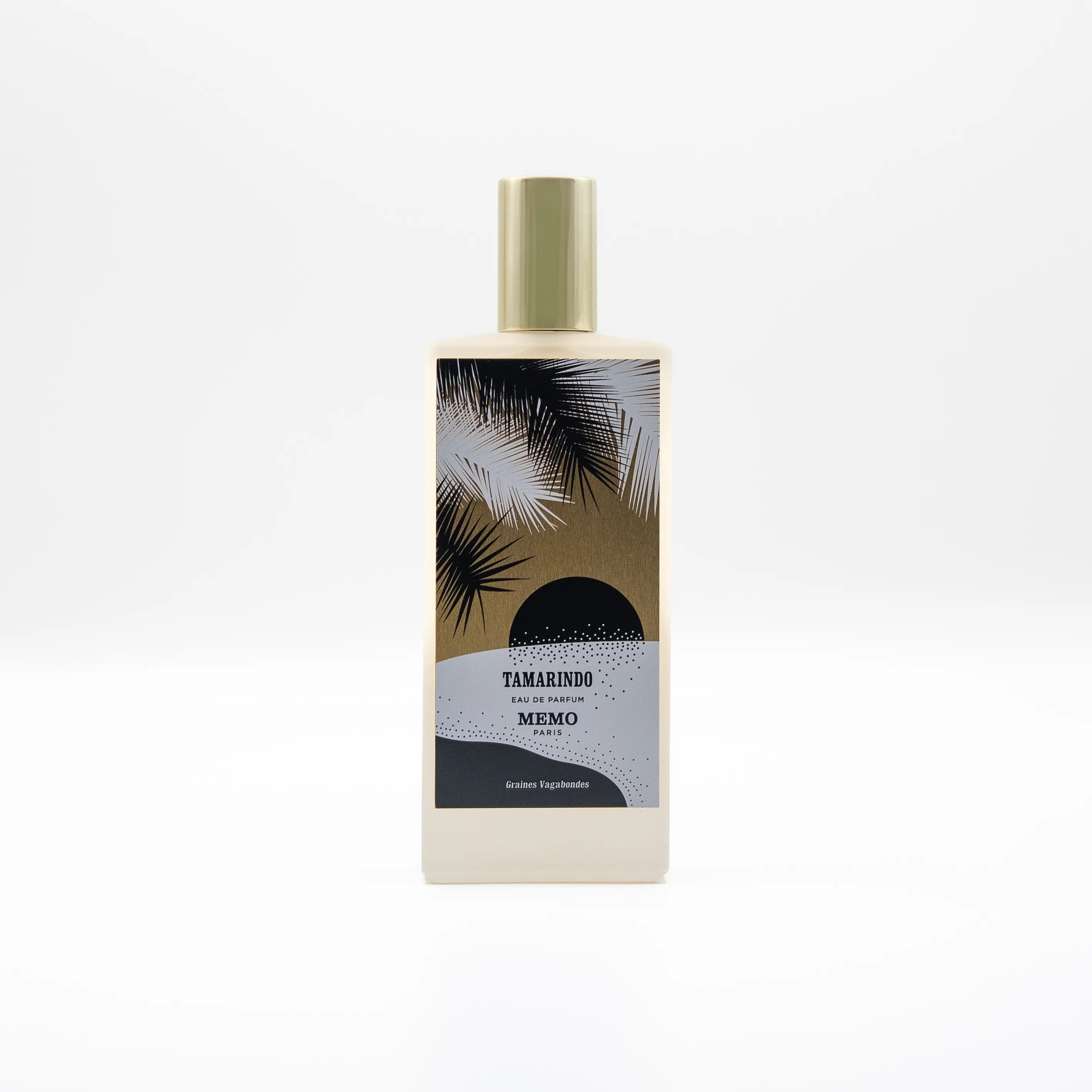 Perfume bottle with palm leaf design on a white background